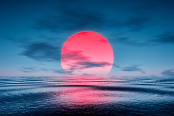 Image showing a red sunset over the blue sea