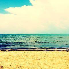 Image showing Sea, beach and big white cloud