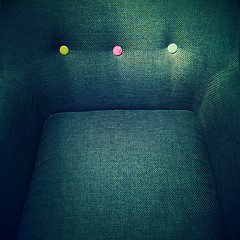 Image showing Stylish armchair with colorful decorative buttons