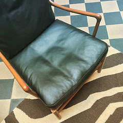 Image showing Leather armchair in retro style interior