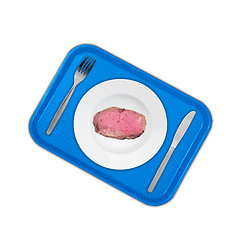 Image showing Cut sirloin beef on a plate with fork and knife