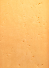 Image showing Background of fresh yellow Swiss cheese with holes