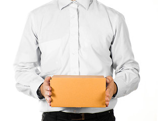 Image showing Businessman holding a paper box