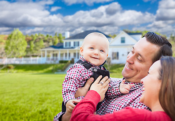 Image showing Baby Having Fun With Mother and Father Out Front