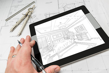 Image showing Hand of Architect on Computer Tablet Showing Bedroom Illustratio