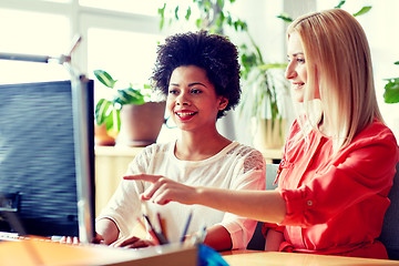 Image showing happy women or students with computer in office