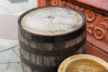 Image showing close up of old wooden barrel table outdoors