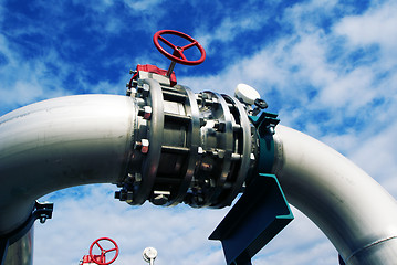 Image showing Industrial zone, Steel pipelines and valves against blue sky