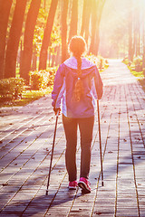 Image showing Woman nordic walking outdoors