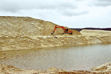 Image showing Working digger in a quarry produces sand