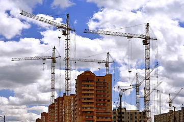 Image showing  Construction site with cranes on sky background