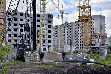 Image showing  Construction site with cranes on sky background