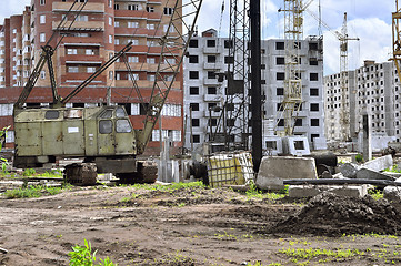 Image showing  Construction site with cranes on sky background