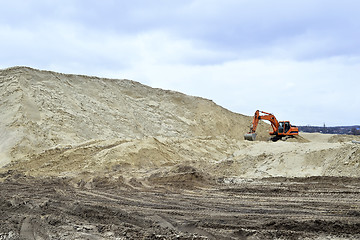 Image showing Working digger in a quarry produces sand