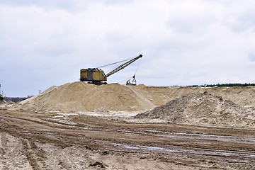 Image showing Working digger in a quarry produces sand