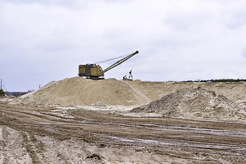 Image showing Working digger in a quarry produces sand