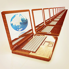 Image showing Computer Network Online concept with Eco Wooden  Laptop and Eart