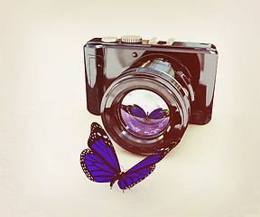 Image showing 3d illustration of photographic camera and butterfly