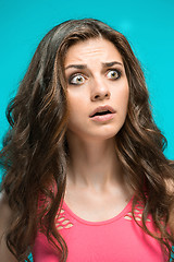 Image showing Portrait of young woman with shocked facial expression