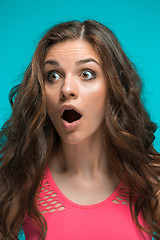 Image showing Portrait of young woman with shocked facial expression