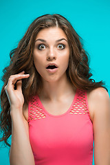 Image showing Portrait of young woman with shocked facial expression