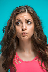 Image showing Portrait of young woman with shocked facial expression