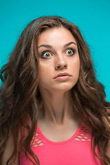 Image showing Portrait of young woman with shocked facial expression