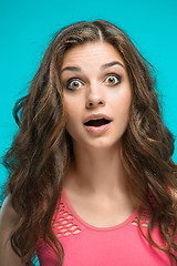 Image showing Portrait of young woman with shocked facial expression