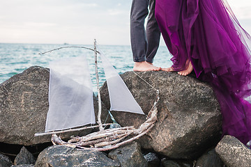 Image showing Young romantic couple on the beach of sea