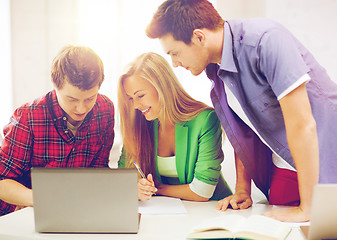 Image showing students writing test or exam in lecture at school