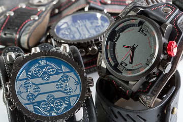 Image showing unusual watches. several alternatives dials