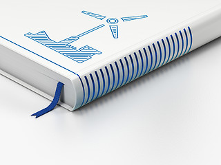 Image showing Industry concept: closed book, Windmill on white background