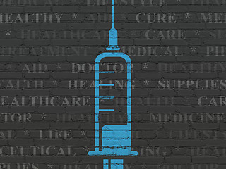 Image showing Health concept: Syringe on wall background