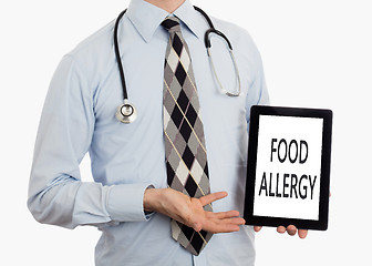 Image showing Doctor holding tablet - Food allergy