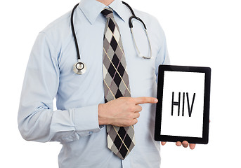 Image showing Doctor holding tablet - HIV