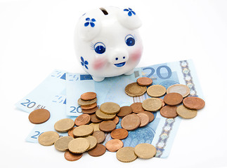 Image showing coins and euro with piggy bank