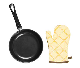 Image showing Kitchen glove with pan on a white