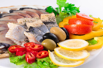 Image showing fresh fish on dish with vegetables
