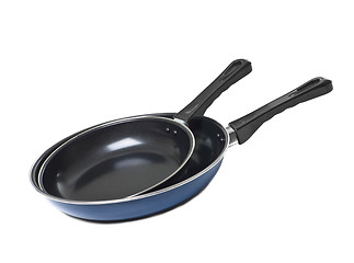 Image showing two pans isolated on white background.