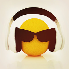 Image showing oranges with sun glass and headphones front \