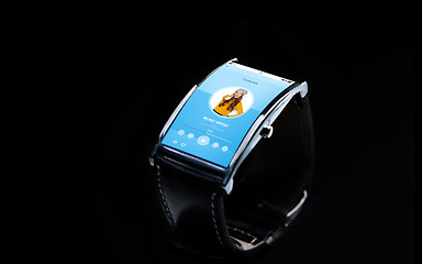 Image showing close up of smart watch with music