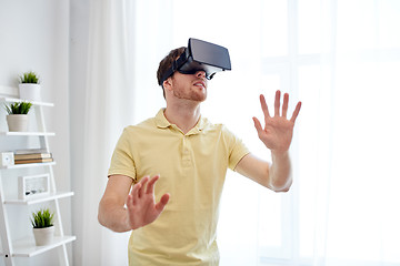 Image showing young man in virtual reality headset or 3d glasses