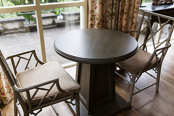 Image showing close up of vintage chairs and table at home