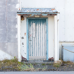 Image showing Front view of a boarded-up abandoned building in Iceland