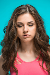 Image showing The young woman\'s portrait with thoughtful emotions