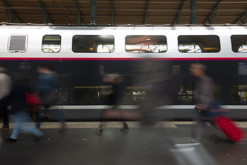 Image showing People coming to or leaving train station platform.