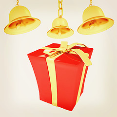 Image showing Gold bell and red gift box with golden ribbon. 3D illustration. 