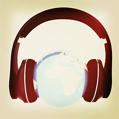 Image showing earth with headphones. World music concept. 3D illustration. Vin