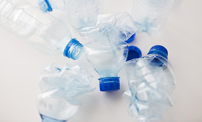 Image showing close up of empty used plastic bottles on table