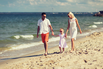 Image showing happy family in sunglasses on summer beach